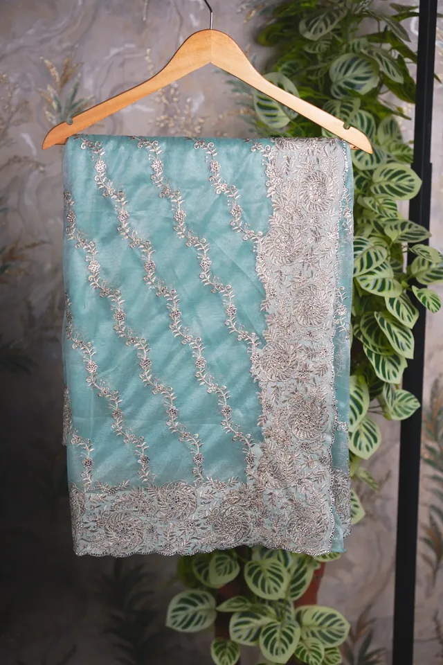 light Sky Soft Seemari Muslin Golden Jari Embroidery Work  Zoxin Stone Work Saree