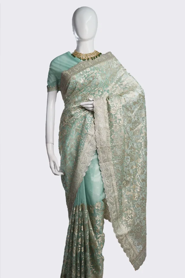 light pesta Soft Seemari Muslin Saree with Siroski Stone & Benaroshi Motif Jari Embroidery Work